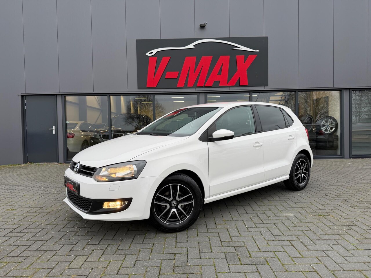 Volkswagen Polo - 1.2 12V Trendline 5 Deurs WIT Navi Airco PDC - AutoWereld.nl