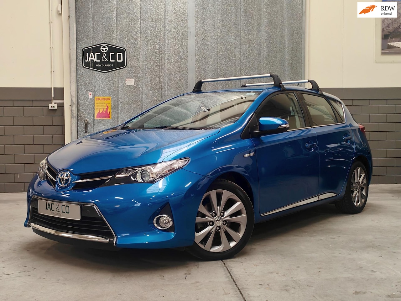 Toyota Auris - 1.8 Hybrid First Edition Nieuwstaat 41.347 KM! - AutoWereld.nl