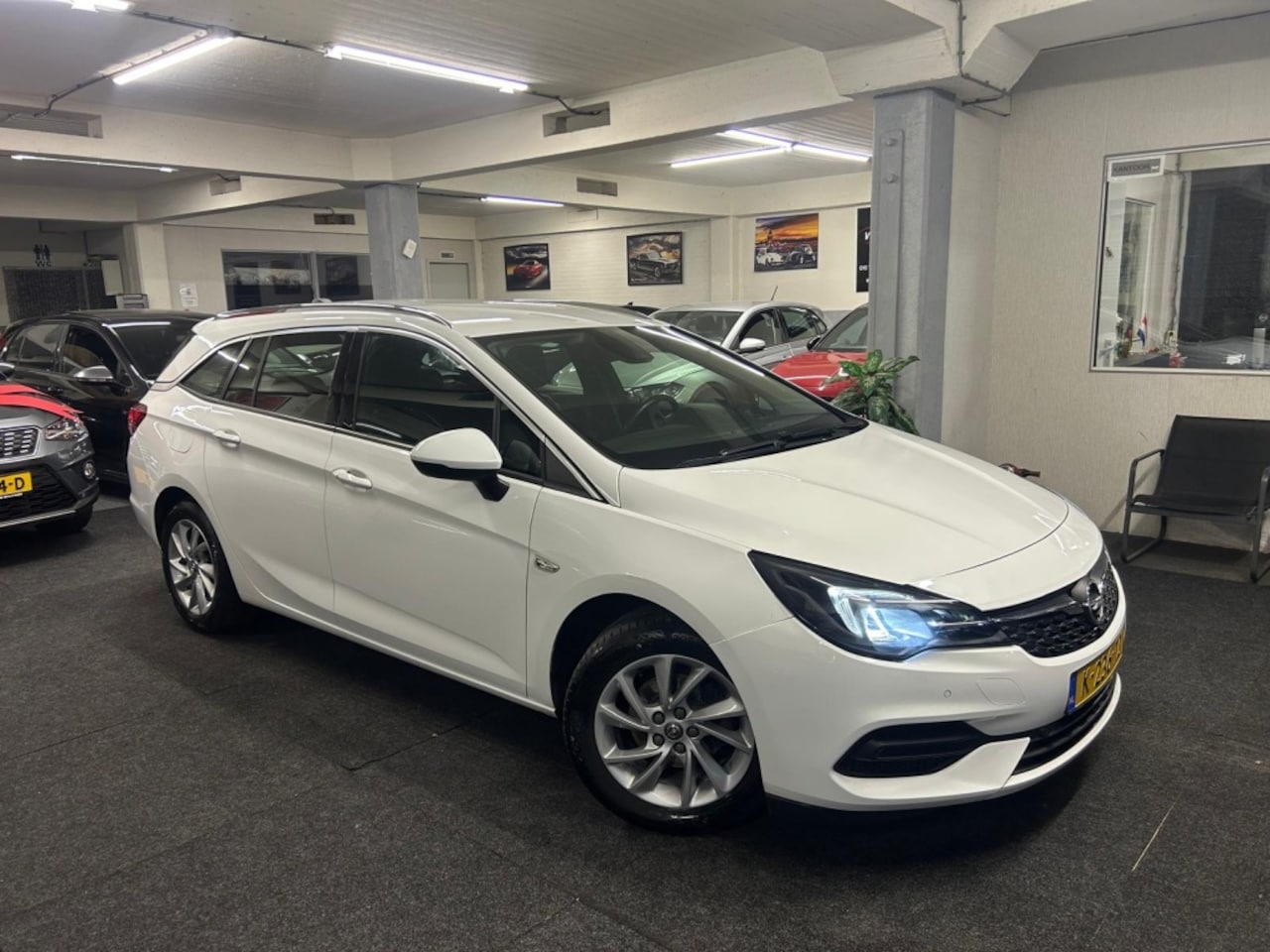 Opel Astra Sports Tourer - 1.2 Bns Elegance*NAP*Xenon*Navigatie*2021 - AutoWereld.nl