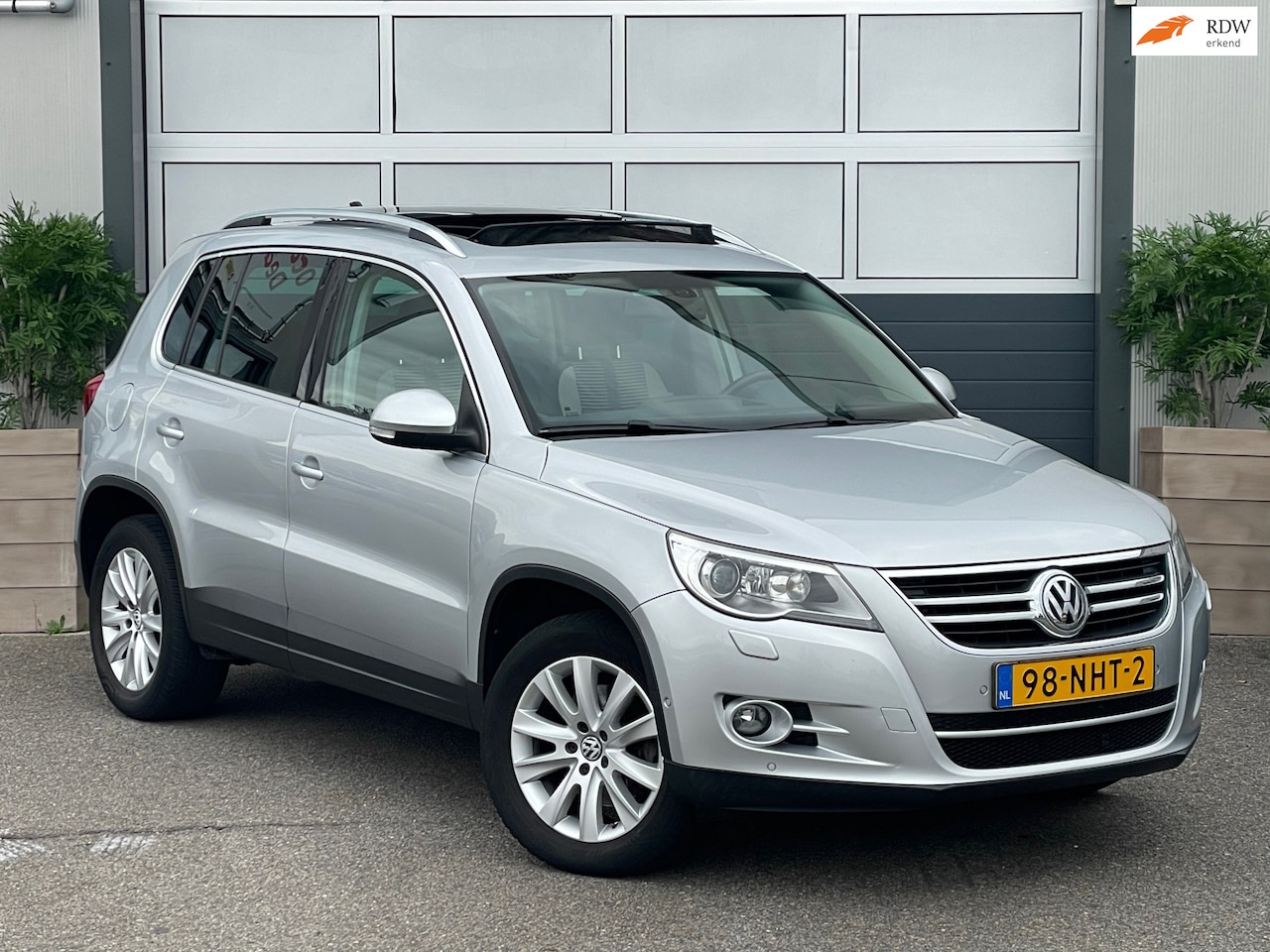 Volkswagen Tiguan - 2.0 TSI Sport&Style 4Motion | PANO | CARPLAY | NAP | CRUIS | TREKHAAK | INRUIL MOGELIJK - AutoWereld.nl