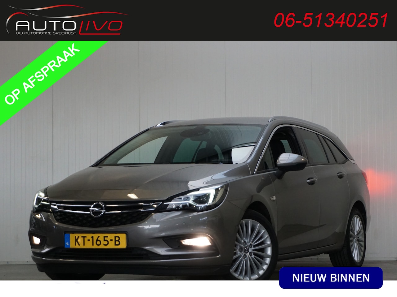 Opel Astra Sports Tourer - 1.6 CDTI Innovation LEER NAVI CLIMA PDC CAMERA TREKHAAK VOL! - AutoWereld.nl