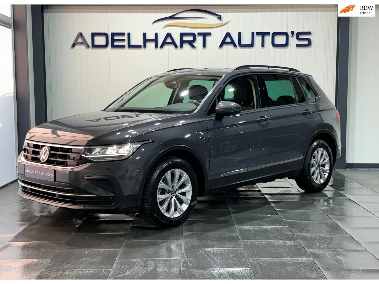 Volkswagen Tiguan - 1.5 TSI Life Automaat / Navigatie full map / Apple CarPlay / Cruise control / Climate cont - AutoWereld.nl