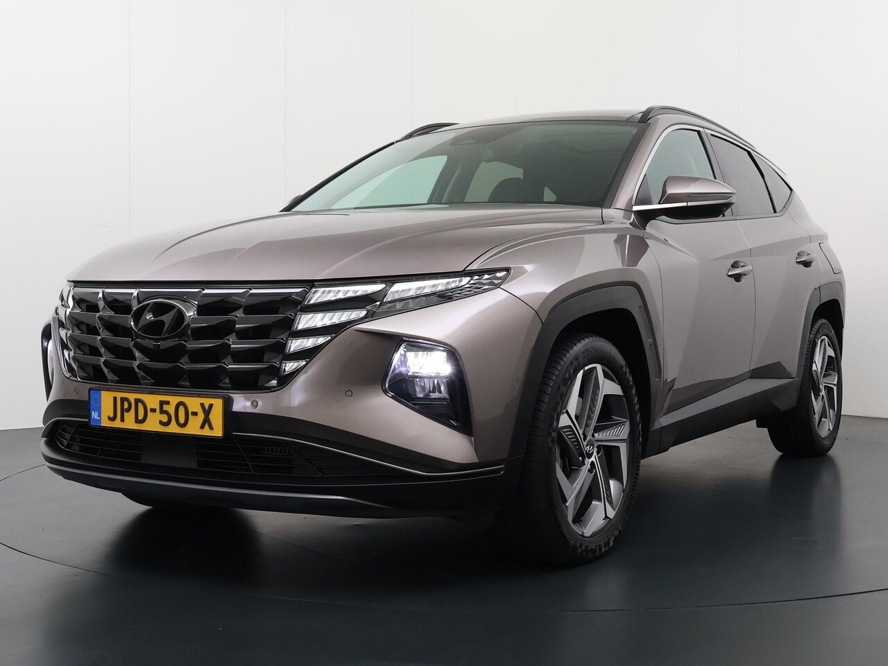 Hyundai Tucson - 1.6 T-GDI HEV Premium Sky Full Options - AutoWereld.nl