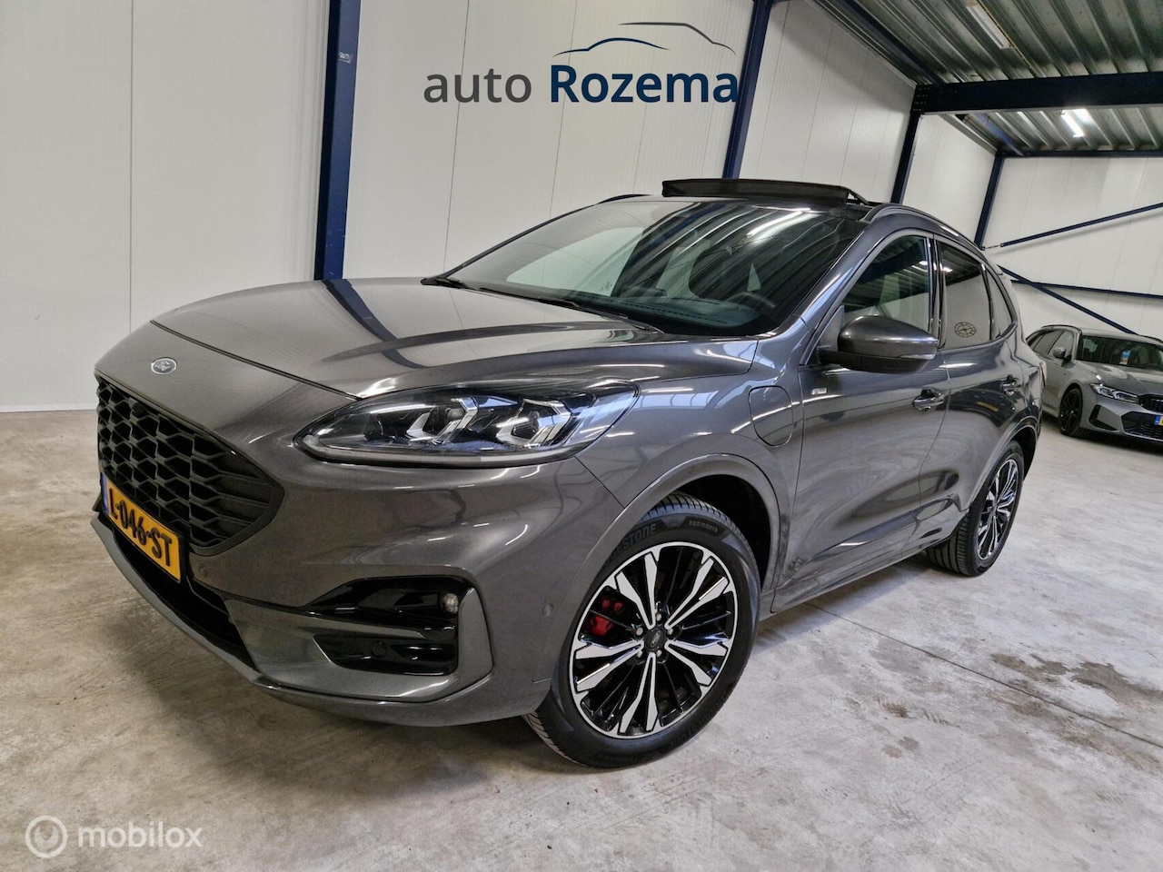 Ford Kuga - 2.5 PHEV ST-Line X Ecc Navi Leder-Alcantara Dak 360 camera Electr-Haak - AutoWereld.nl