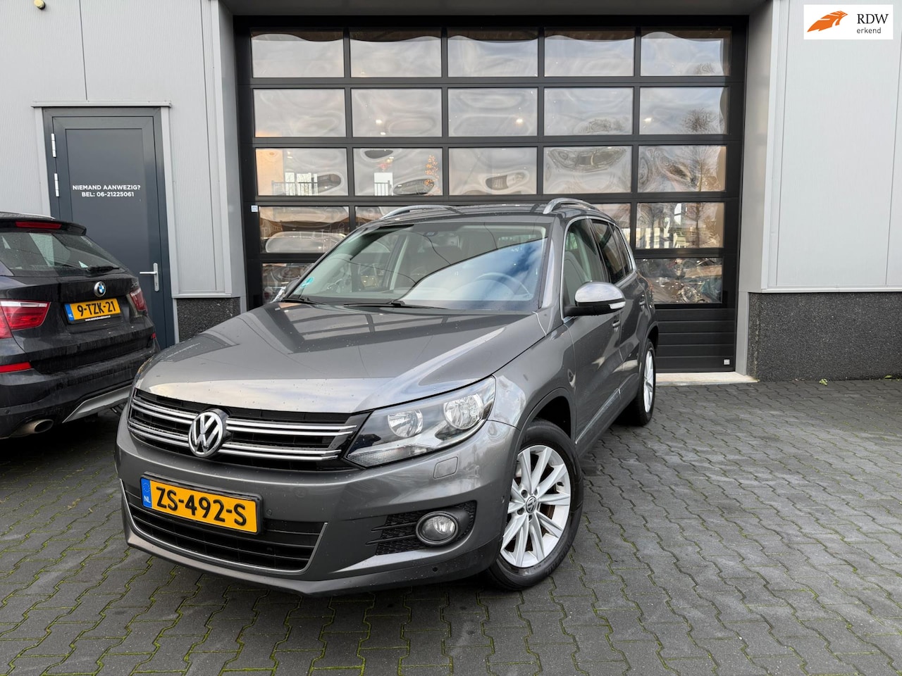 Volkswagen Tiguan - 1.4 TSI Sport&Style automaat trekhaak - AutoWereld.nl