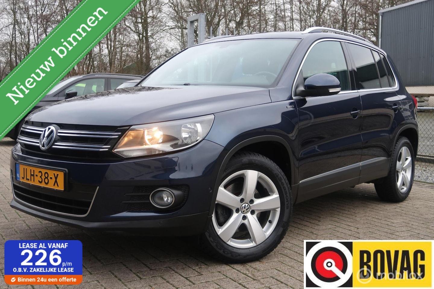 Volkswagen Tiguan - 1.4 TSI Sport&Style TREKHAAK,CAMERA,CLIMA - AutoWereld.nl