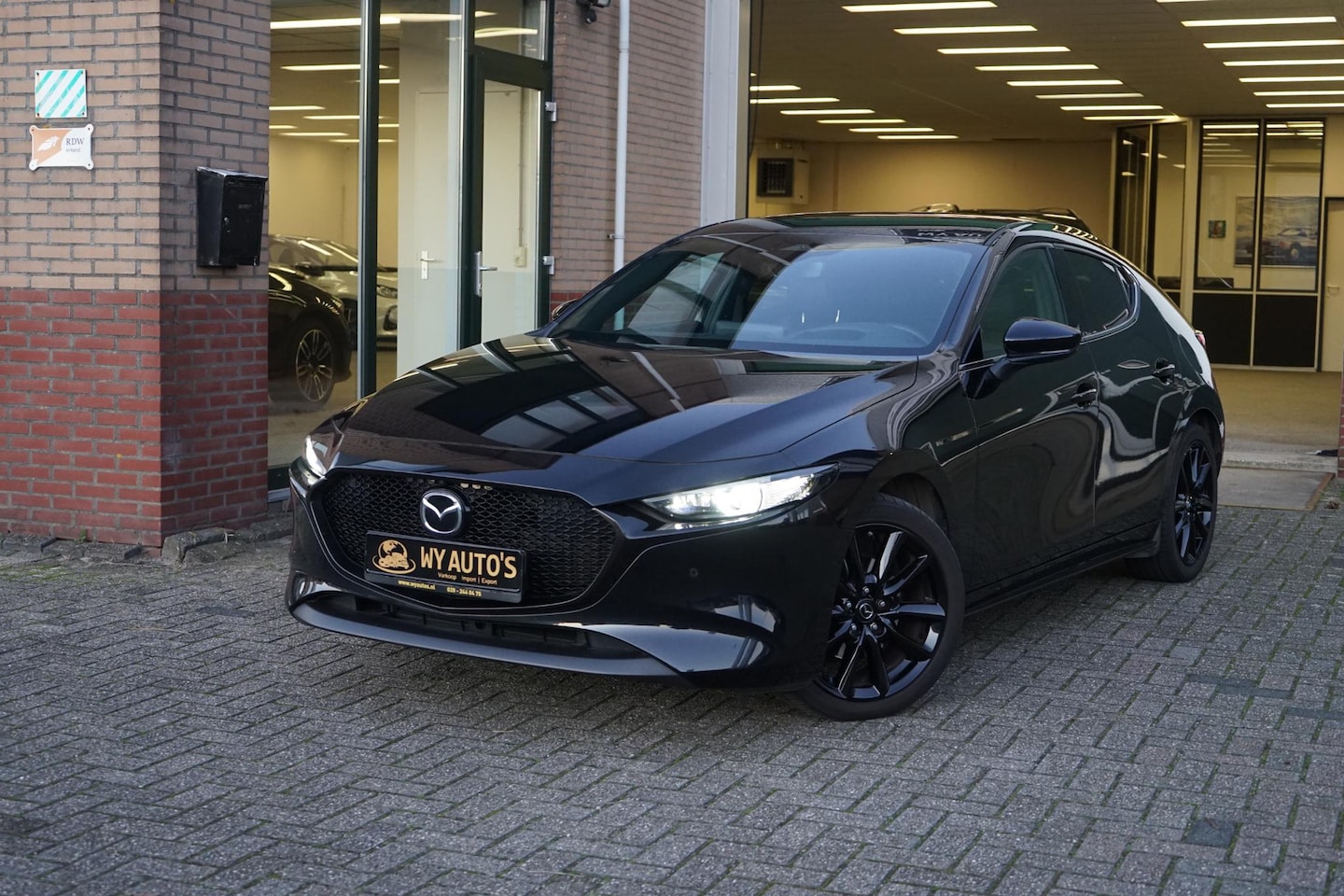 Mazda 3 - 2.0 e-SkyActiv-X M Hybrid 186 Exclusive-line BOSE | LEDER | HEAD-UP | 18" - AutoWereld.nl