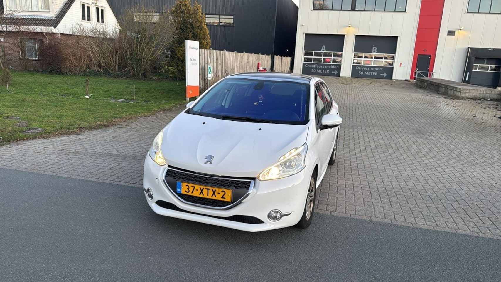 Peugeot 208 - 1.2 VTi Allure Panorama Dak Clima Navigatie Wit 2012 - AutoWereld.nl