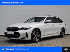 BMW 3-serie Touring - 330e xDrive High Executive M Sport Automaat / Panoramadak / Trekhaak / Sportstoelen / M Ad