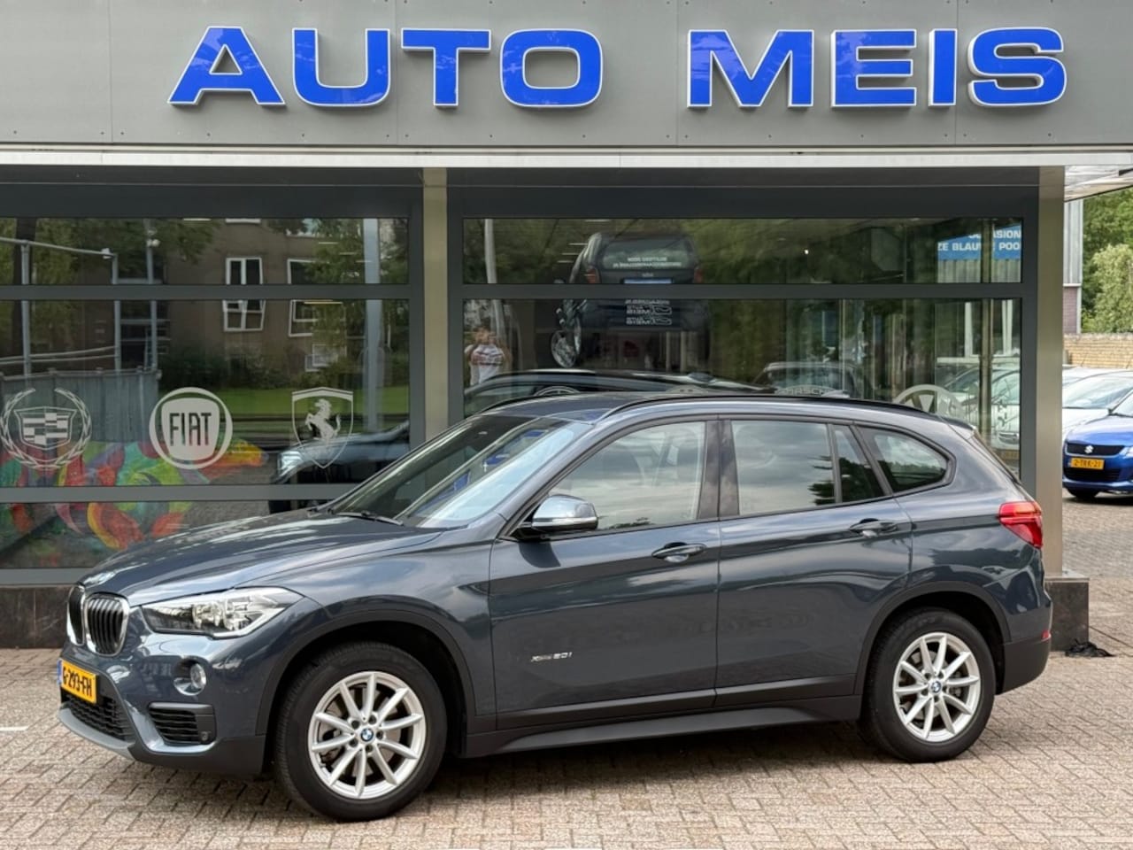BMW X1 - xDrive 20i Automaat Clima Cruise PDC Incl. onderhoudscontract 2028! - AutoWereld.nl