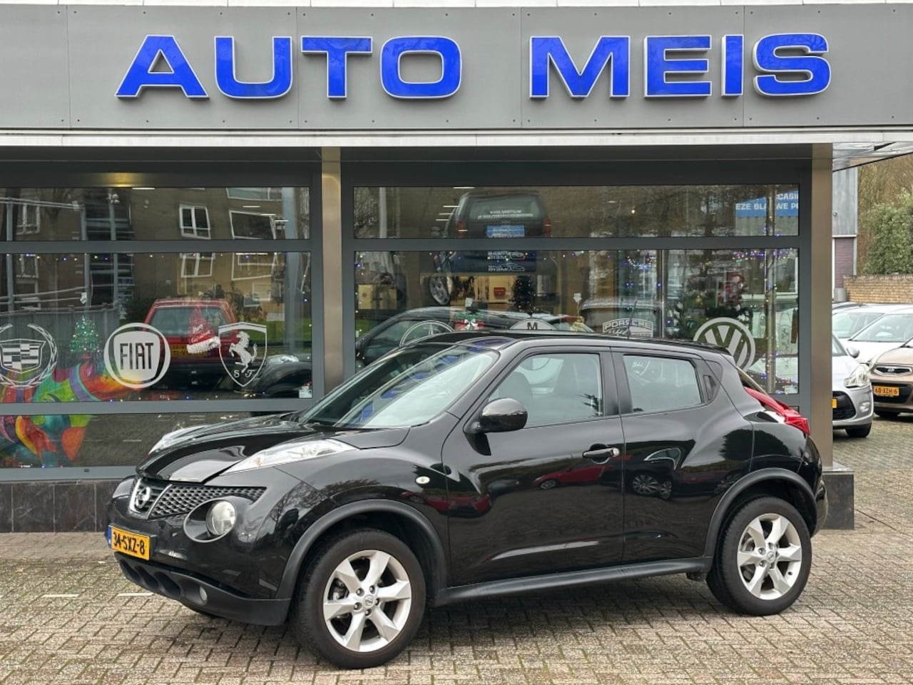 Nissan Juke - 1.6 ACENTA ECO Navi  camera Airco - AutoWereld.nl