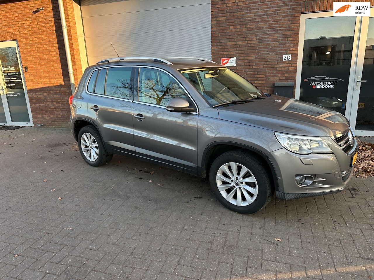 Volkswagen Tiguan - 2.0 TSI Sport&Style 4Motion|AUTOMAAT|PANO|R-LINE - AutoWereld.nl