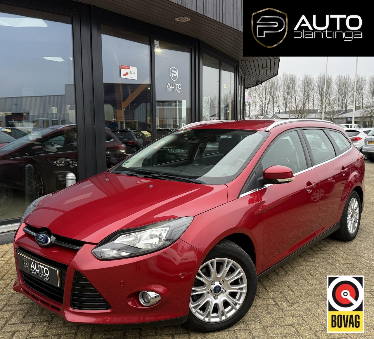 Ford Focus Wagon - 1.6 EcoBoost Titanium 182PK | Trekhaak | Stoelverwarming | Voorruitverwarming | Cruise Con - AutoWereld.nl