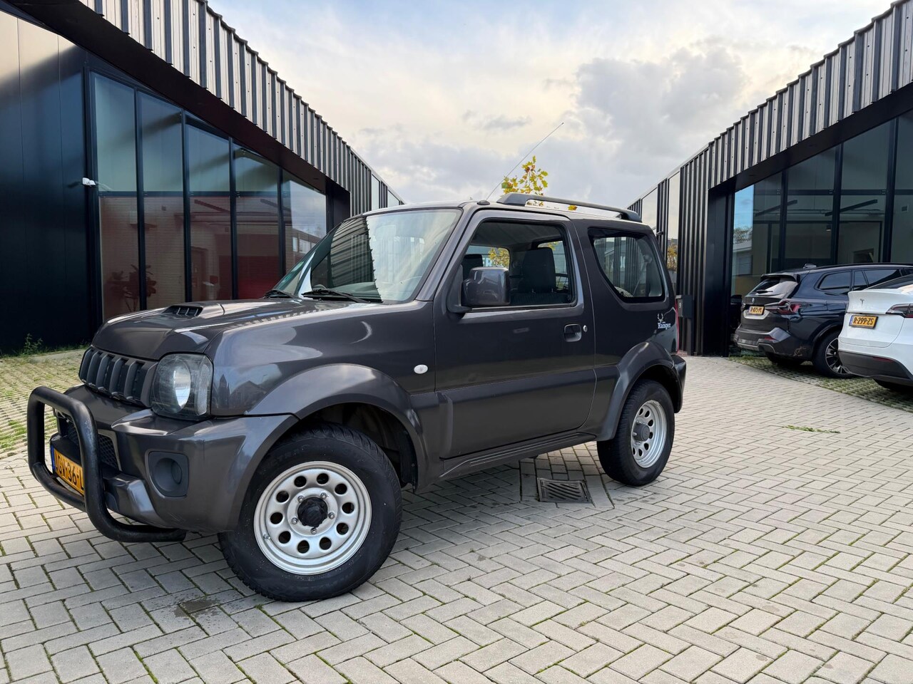 Suzuki Jimny - 1.3 Exclusive Airco Stoelvw 4WD - AutoWereld.nl