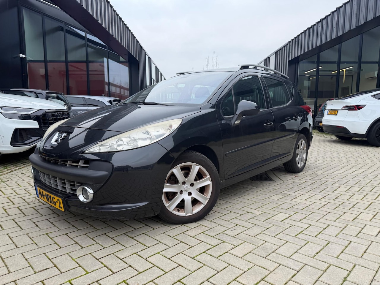 Peugeot 207 SW - 1.6 VTi X-line Clima Automaat Export - AutoWereld.nl