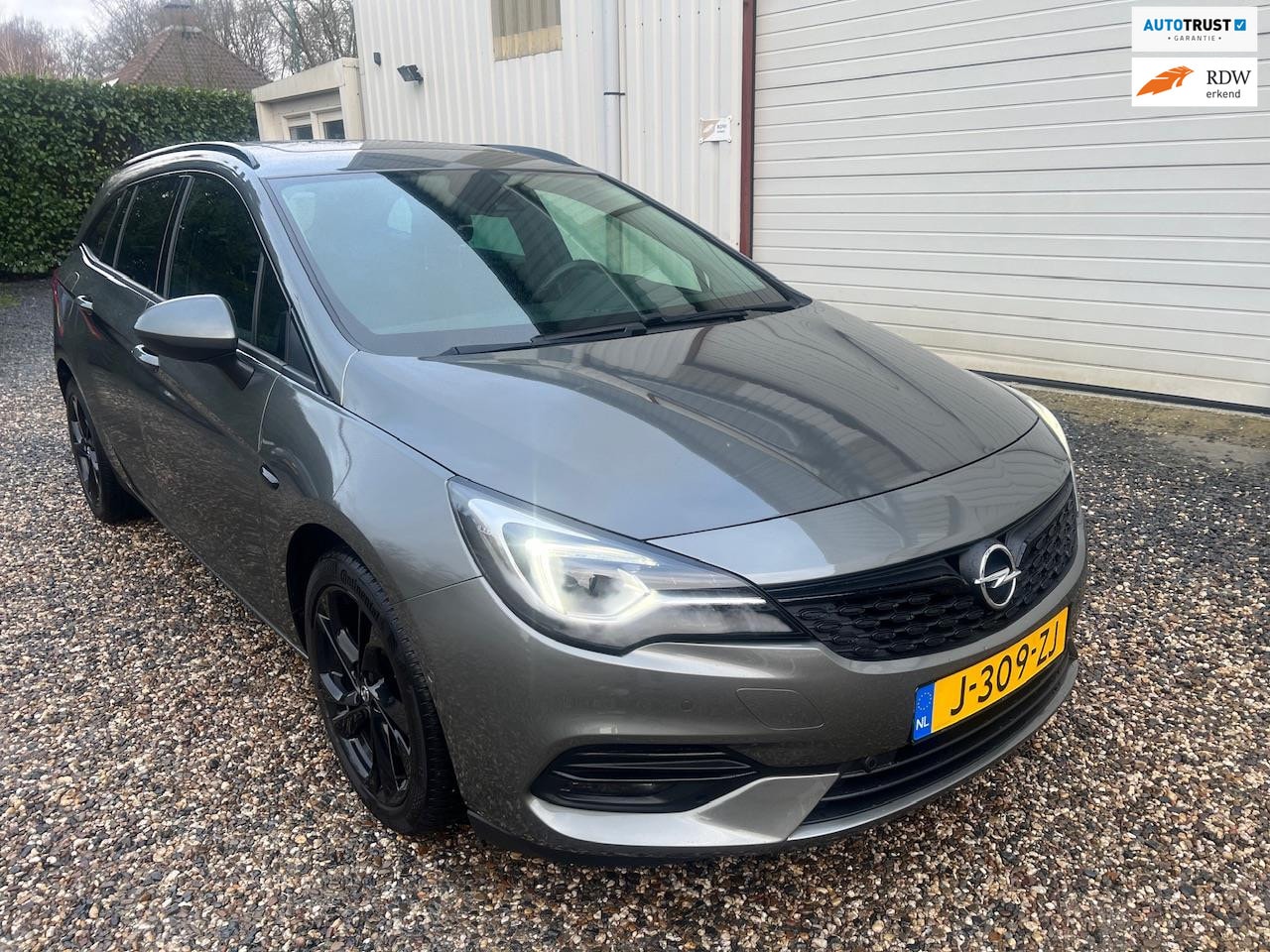 Opel Astra Sports Tourer - 1.4 Ultimate AUT.DAKJE.NAVI.CAM.LEER.XENON.NAP! - AutoWereld.nl