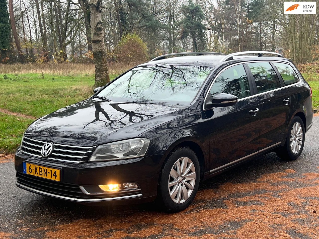 Volkswagen Passat Variant - 1.6 TDI Highline BlueMotion 2012 Zwart Navi Chroom - AutoWereld.nl