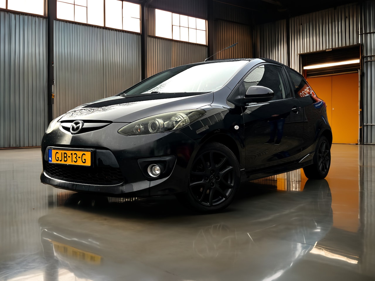 Mazda 2 - 1.3 TS draadlooscarplay_Stoelverwarming_Airco - AutoWereld.nl
