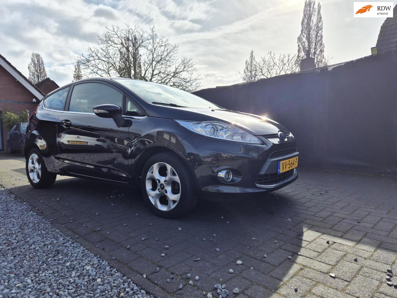 Ford Fiesta - 1.25 Ghia 3 Drs Met Clima en stoelverwarming - AutoWereld.nl