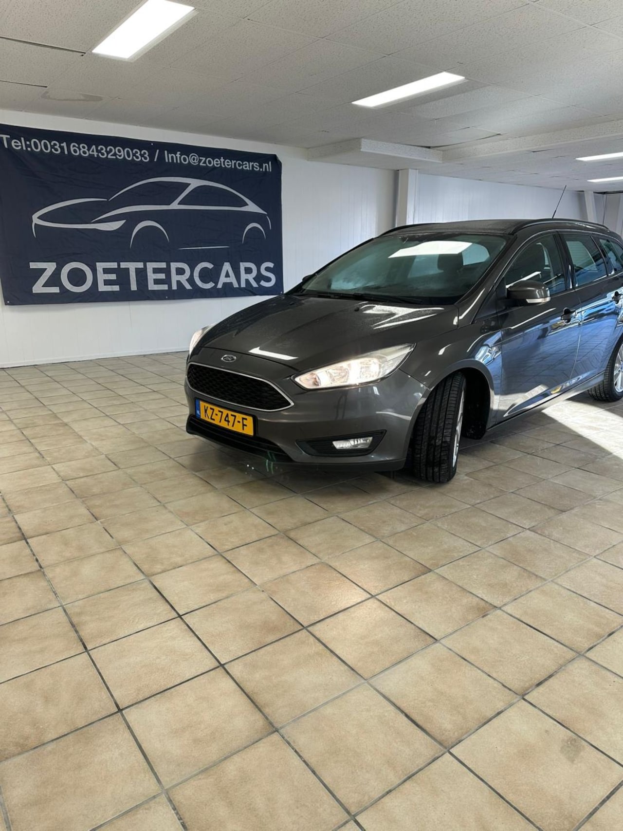 Ford Focus Wagon - 1.0 Trend Carpley,Navigatie,automaat - AutoWereld.nl