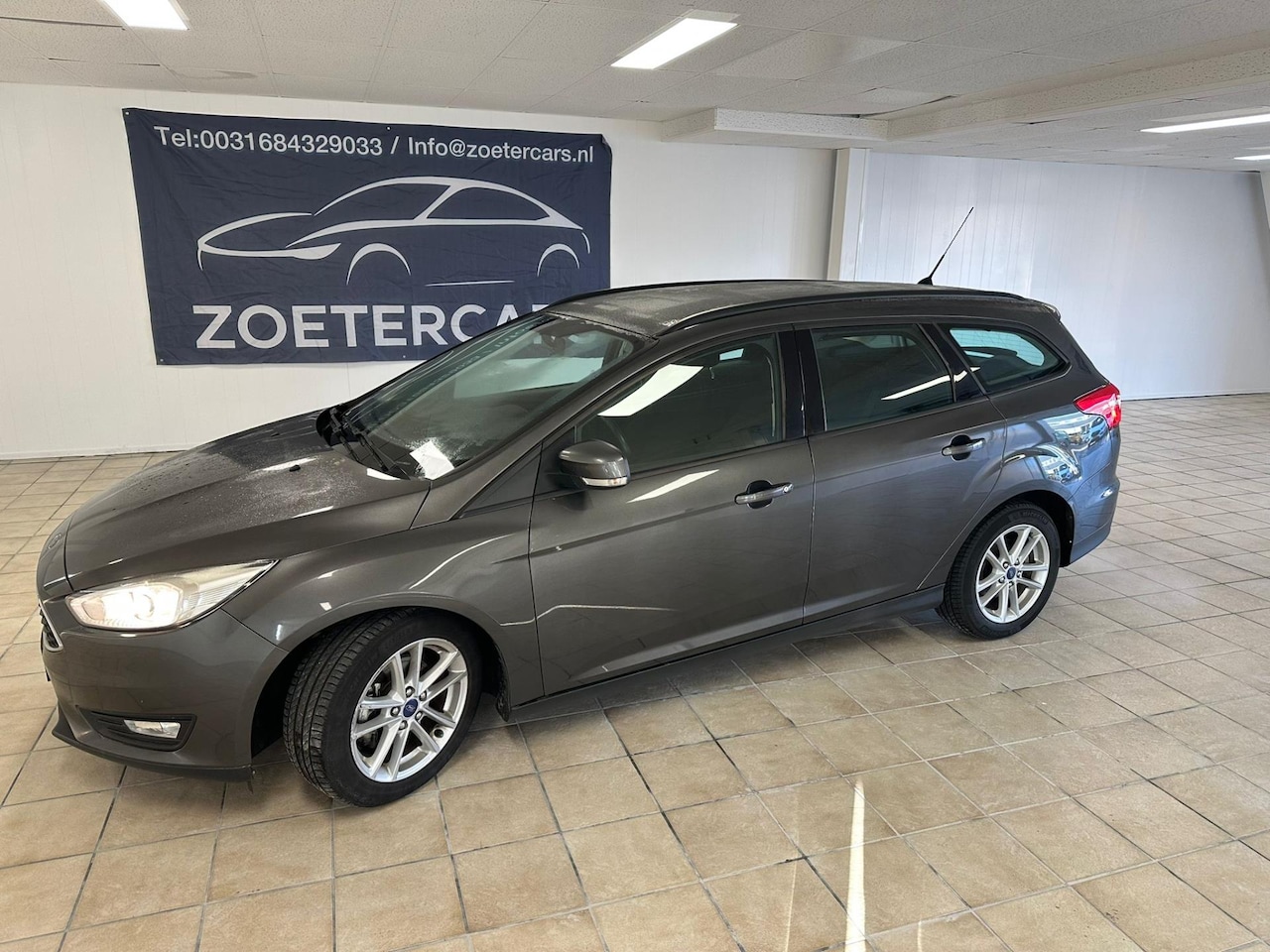 Ford Focus Wagon - 1.0 Trend Carpley,Navigatie,automaat - AutoWereld.nl