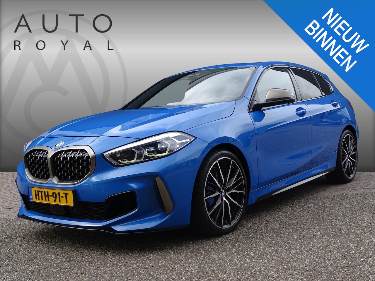 BMW 1-serie - M135i xDrive High Executive PANORAMADAK|HEAD-UP DISPLAY|DODEHOEK DETECTIE|ACHTERUIT RIJ CA - AutoWereld.nl