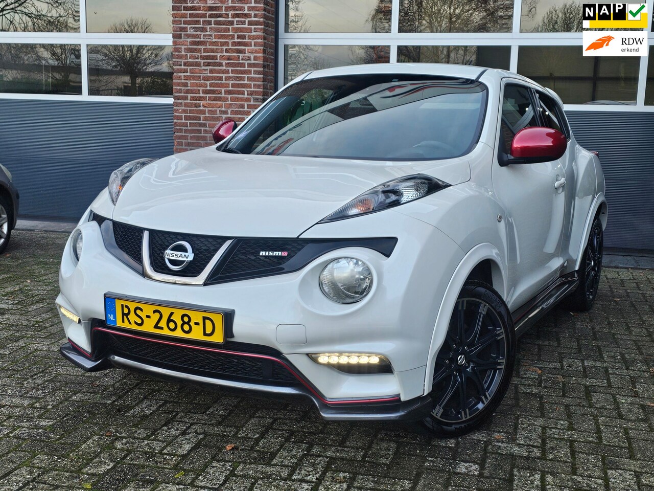 Nissan Juke - 1.6 Turbo NISMO All-Mode Automaat |Parelmoer |Camera - AutoWereld.nl