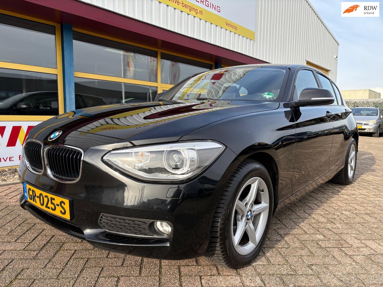 BMW 1-serie - 114i EDE High Executive LEDER APK T/M 21-12-2026 - AutoWereld.nl