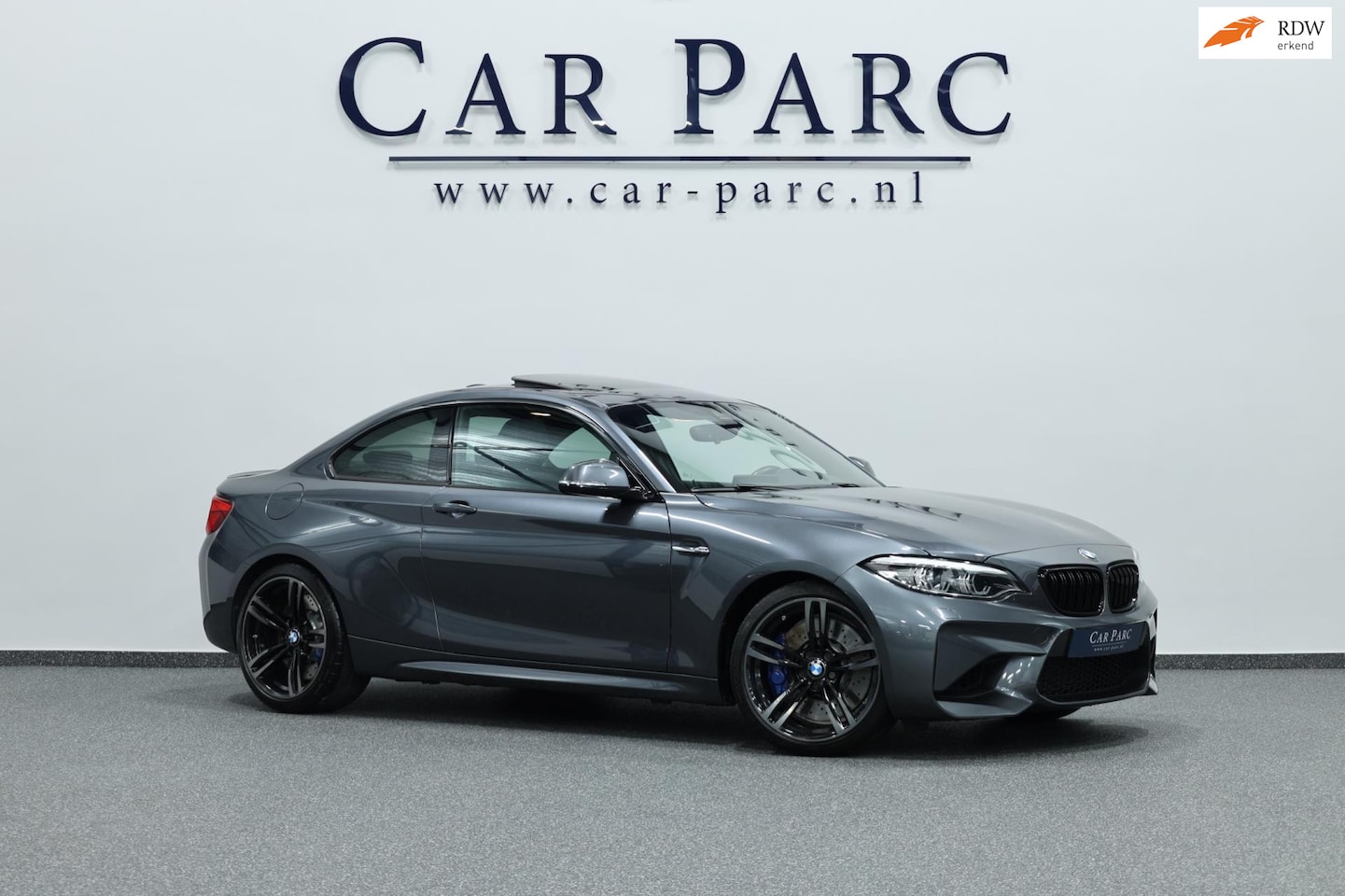 BMW 2-serie Coupé - M2 DCT 370+PK NETTE STAAT/LED/LEER+S.VERWARMING+MEMORY/19" LMV/CAM/CRIUSE/ECC/12 MND GARAN - AutoWereld.nl