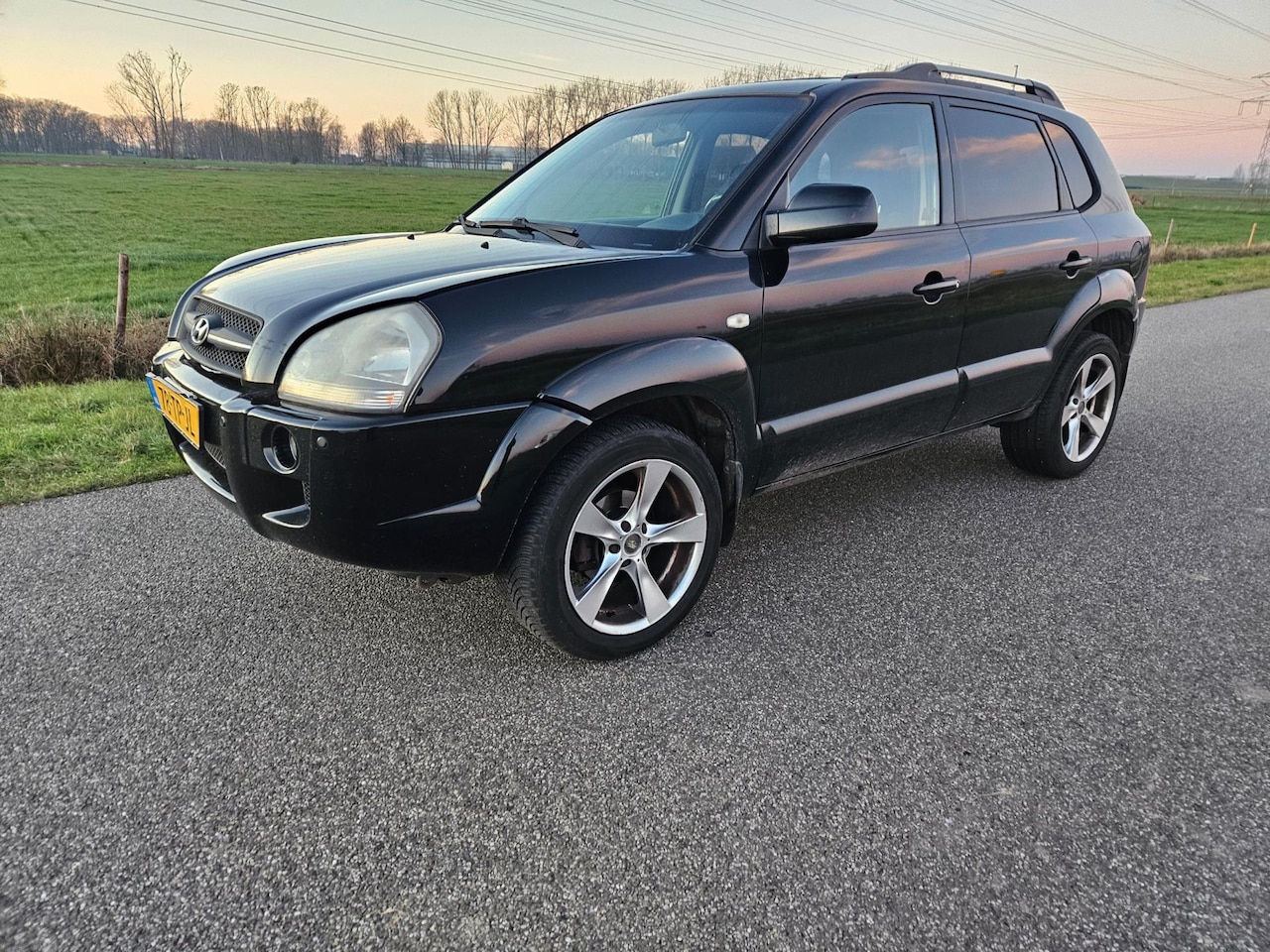 Hyundai Tucson - 2.0i Style 5 deurs Airco - AutoWereld.nl