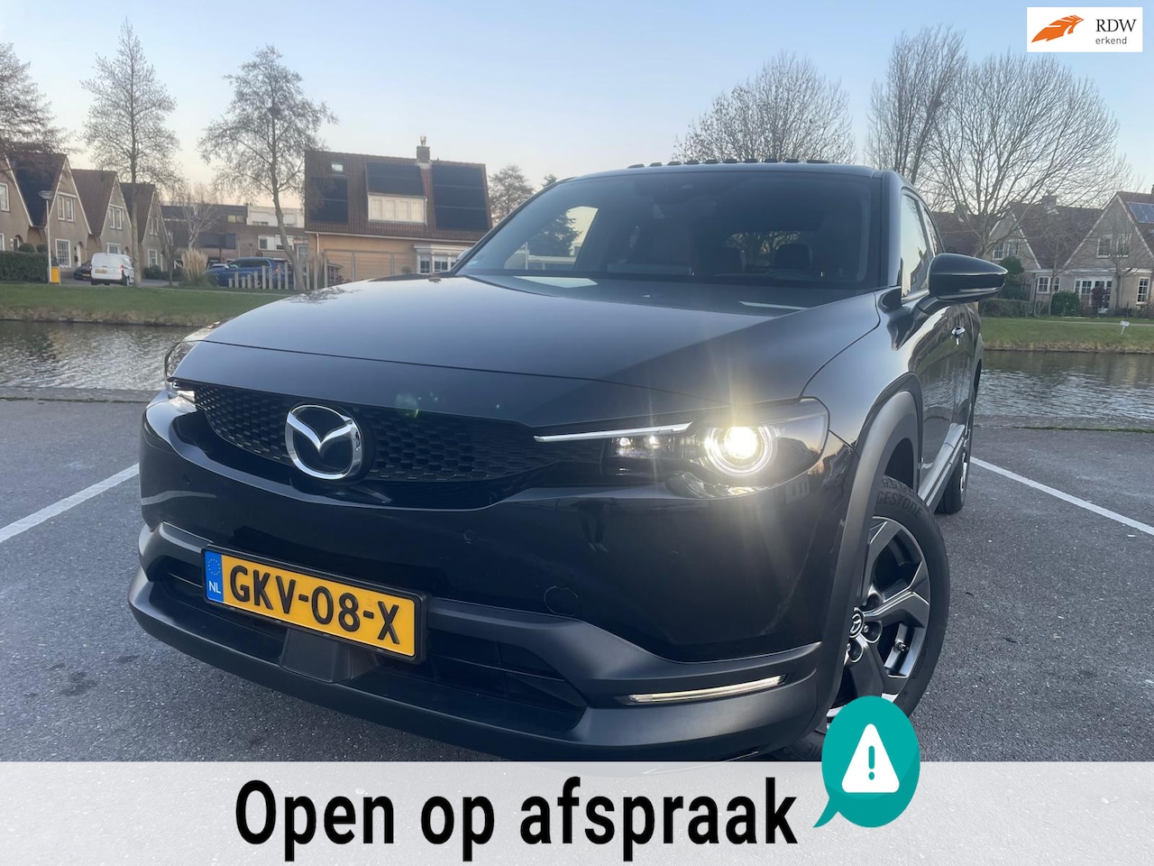 Mazda MX-30 - E-SkyActiv 145 Luxury 36 kWh OPEN DAK NAVI 94% SOH - AutoWereld.nl