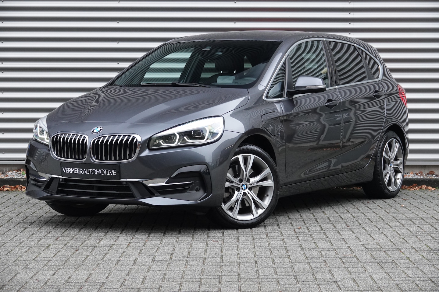 BMW 2-serie Active Tourer - 225xe iPerformance High Executive | Harman & Kardon | Leder | HUD | Camera | Navi | DAB | - AutoWereld.nl