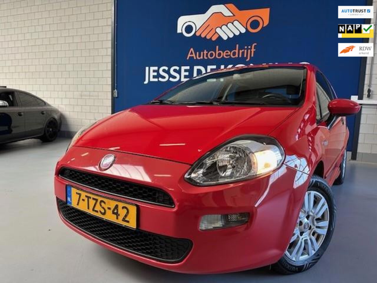 Fiat Punto Evo - 0.9 TwinAir Street 0.9 TwinAir Street,bj.2014,kleur:rood,airco,sportvelgen,NAP met 168711 km.en APK tot 10/20 - AutoWereld.nl