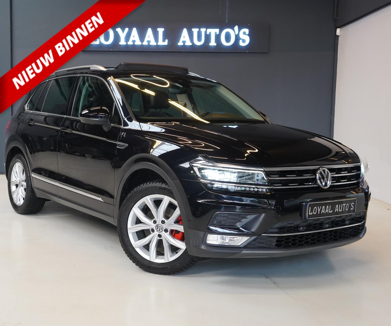 Volkswagen Tiguan - 1.4 TSI ACT Comfortline Business R | AUT | NAVI | CRUISE | XENON | LEER | APK. - AutoWereld.nl