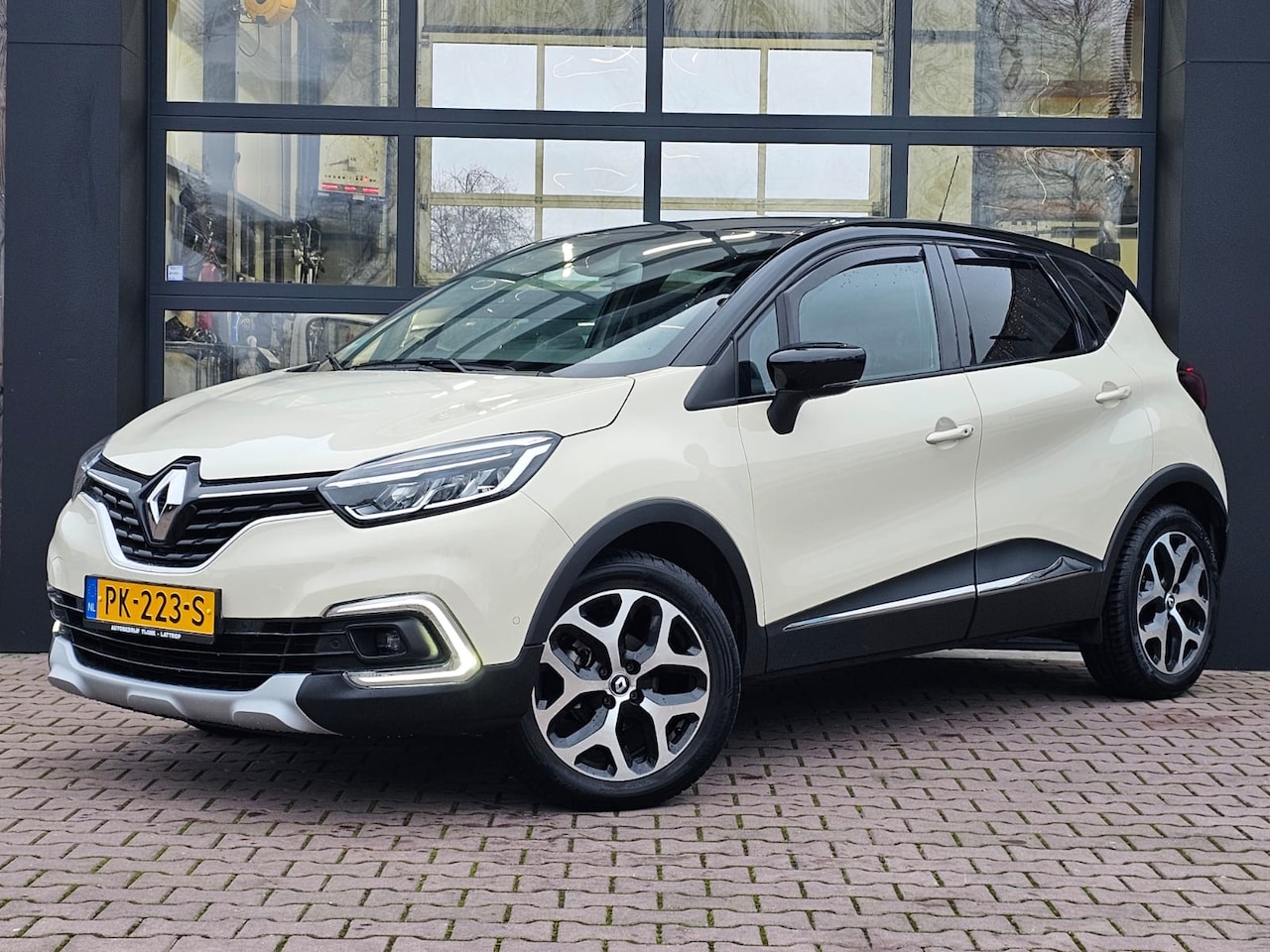 Renault Captur - 0.9 TCe Intens | LED | Trekhaak | Navi | Carplay | Twotone | - AutoWereld.nl