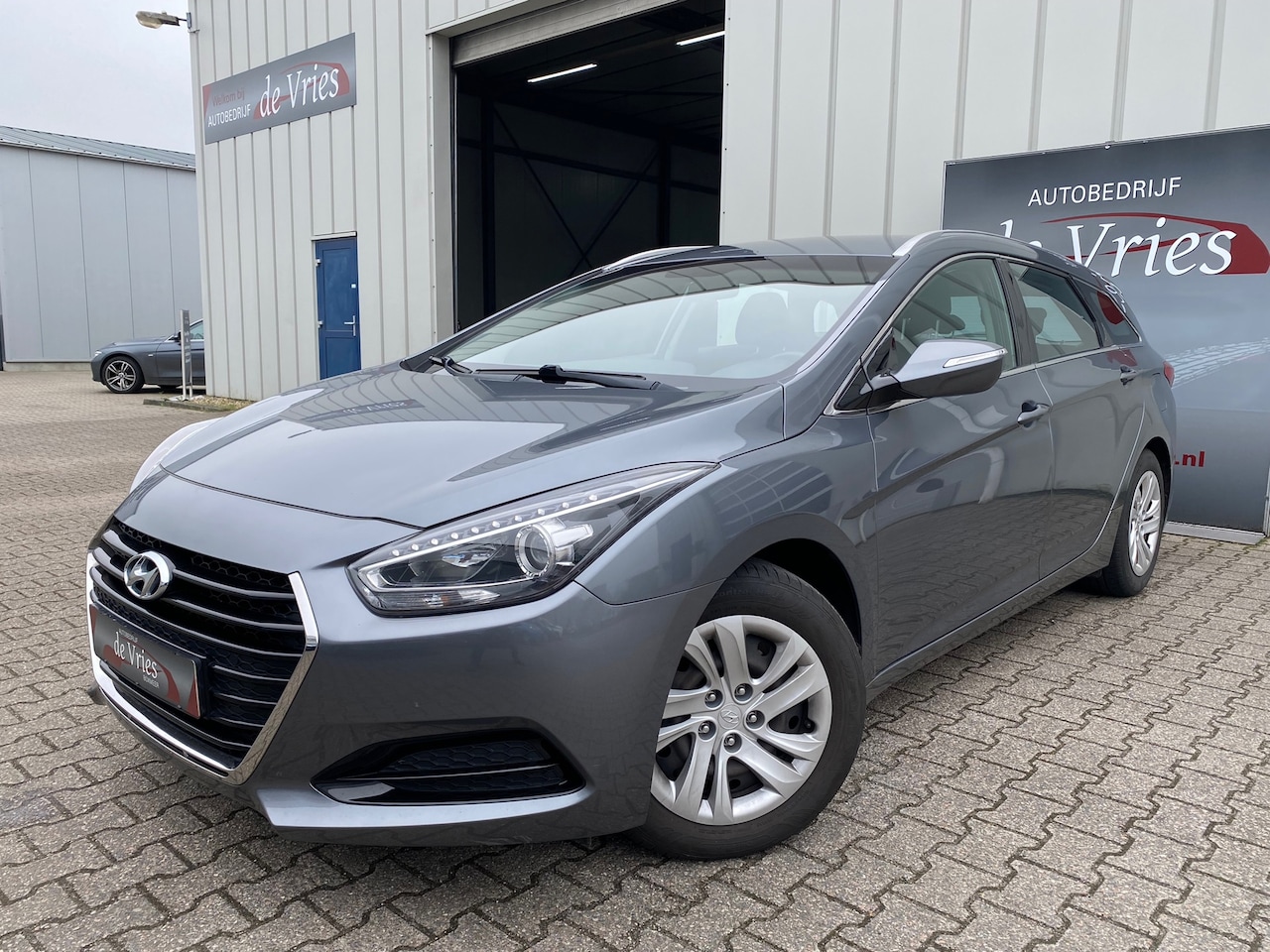 Hyundai i40 Wagon - 1.6 GDI Comfort Business / Airco / Trekhaak / Telefoon - AutoWereld.nl
