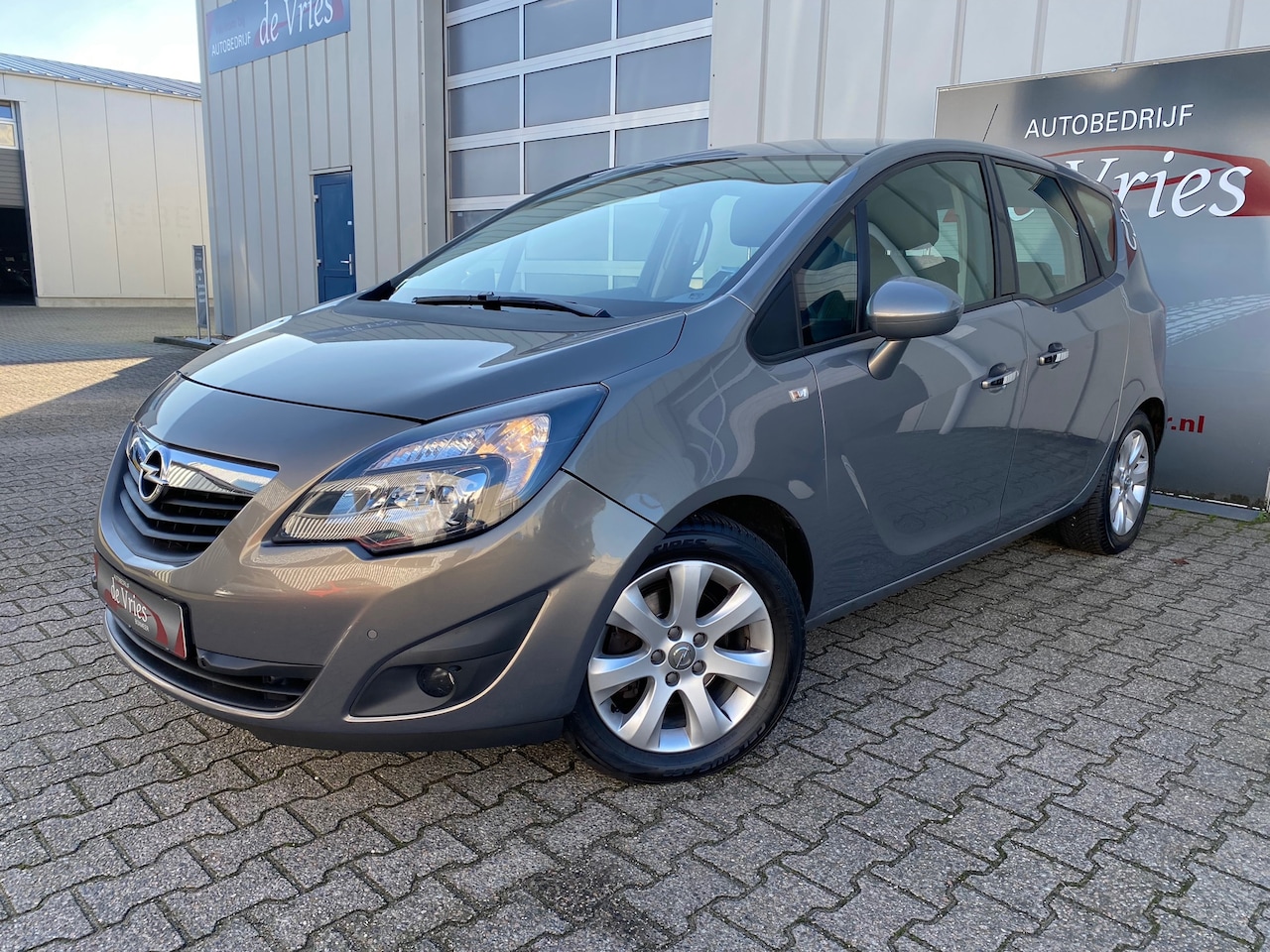Opel Meriva - 1.4 Turbo Cosmo / Clima / Cruise / Stuur en stoelverw. / Trekhaak / PDC / LMV - AutoWereld.nl