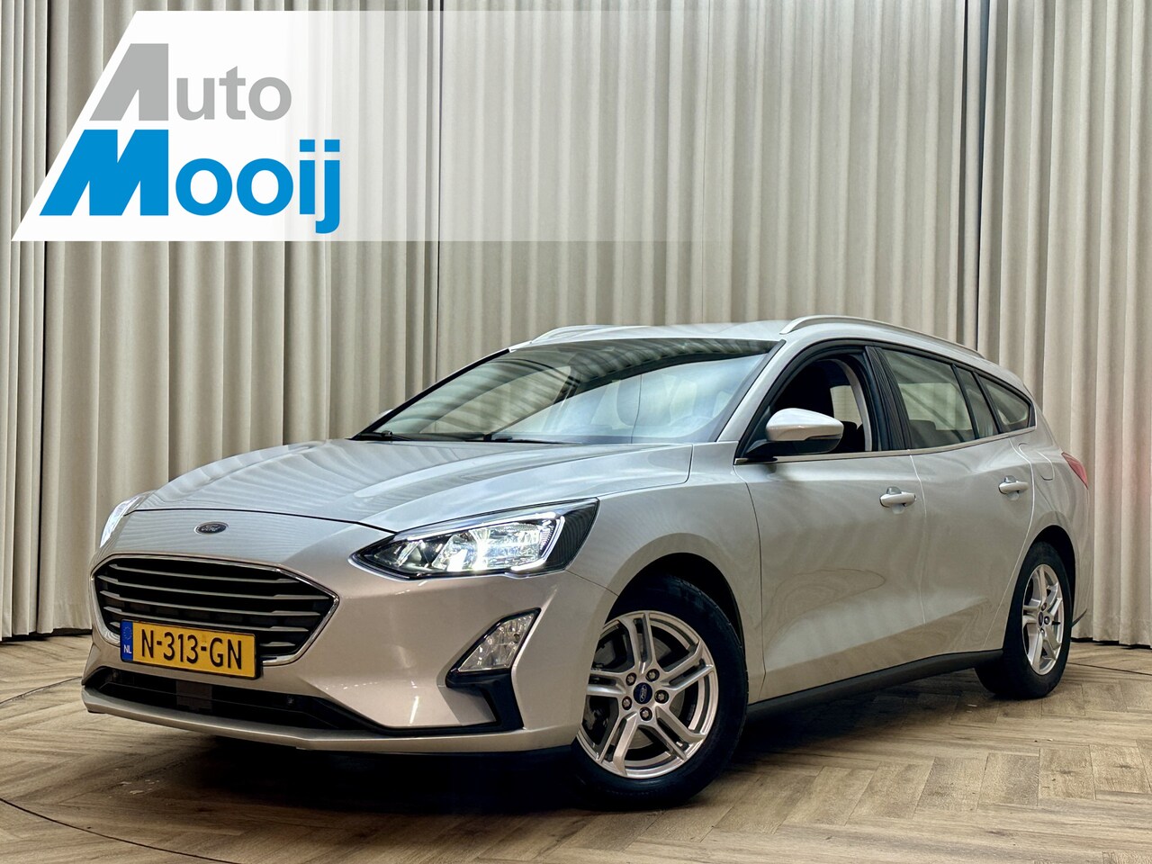 Ford Focus Wagon - 1.0 EcoBoost Hybrid *Apple Carplay* Camera / Cruise / Navigatie / LED / Lane Assist / 16'' - AutoWereld.nl
