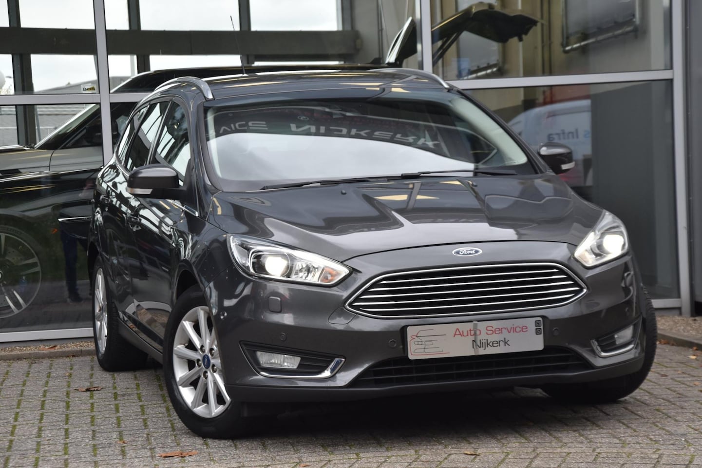 Ford Focus Wagon - 1.0 Titanium Edition Airco Leder Xenon Pdc 1ste Eigenaar - AutoWereld.nl