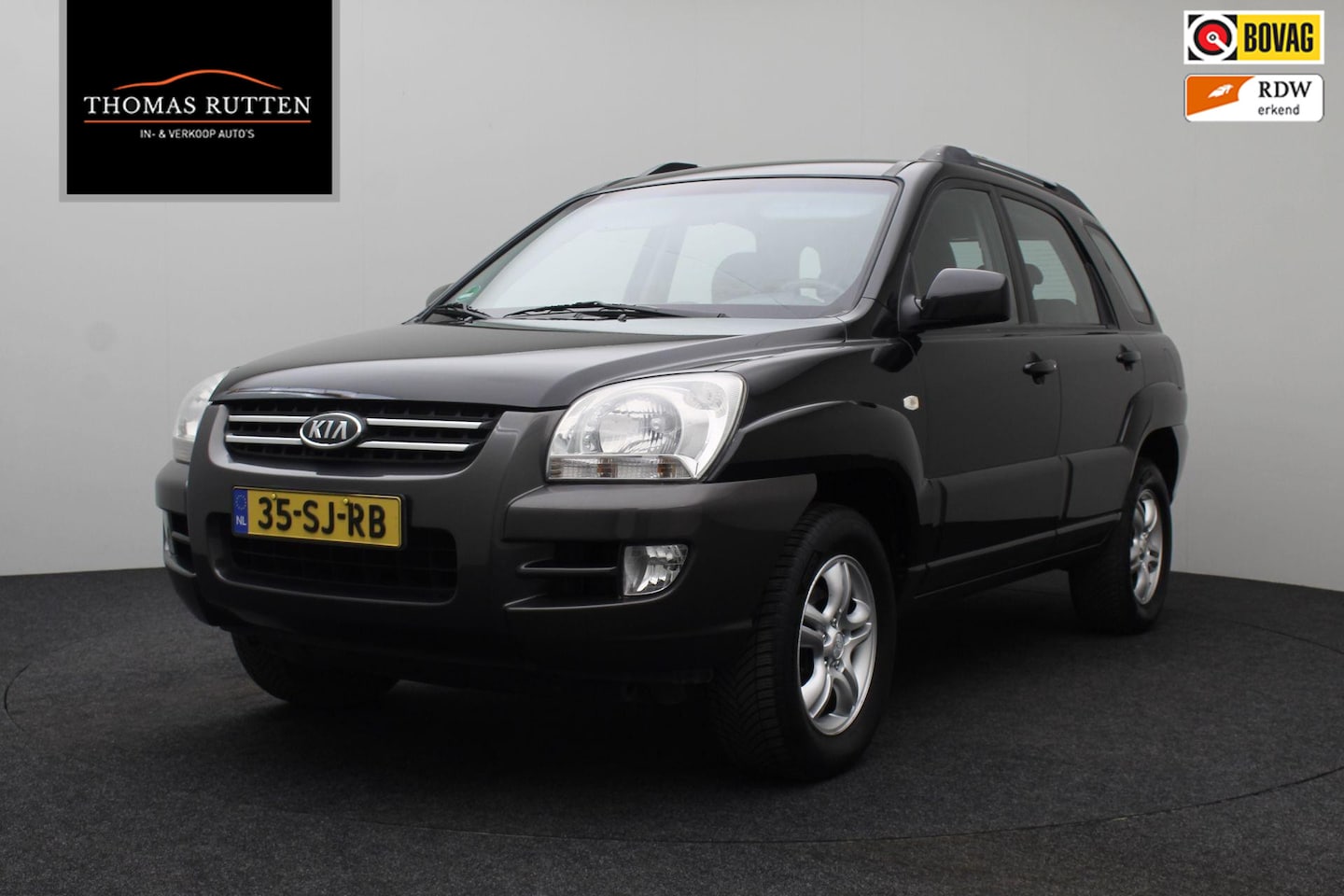 Kia Sportage - 2.0 CVVT Comfort 2006 NAP | Airco | Cruise control | Trekhaak | Elektrische ramen | Goed o - AutoWereld.nl