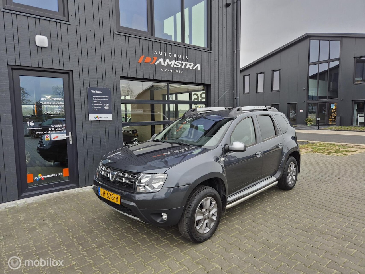 Dacia Duster - 1.2 TCe 4x2 Lauréate|Trekhaak|Cruise|Navi|Airco|Side bars| - AutoWereld.nl