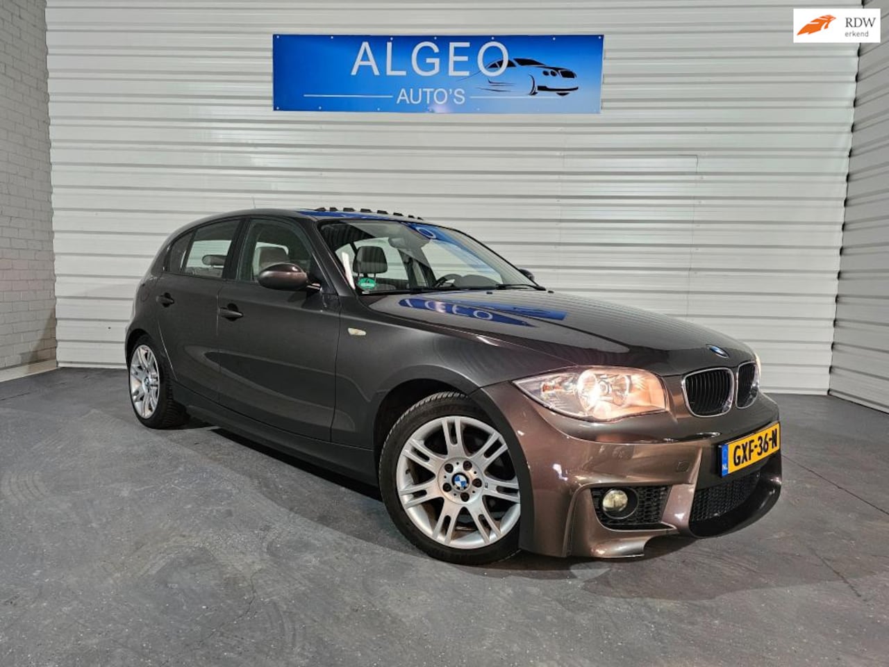 BMW 1-serie - 120i / Leer / Schuifdak - AutoWereld.nl
