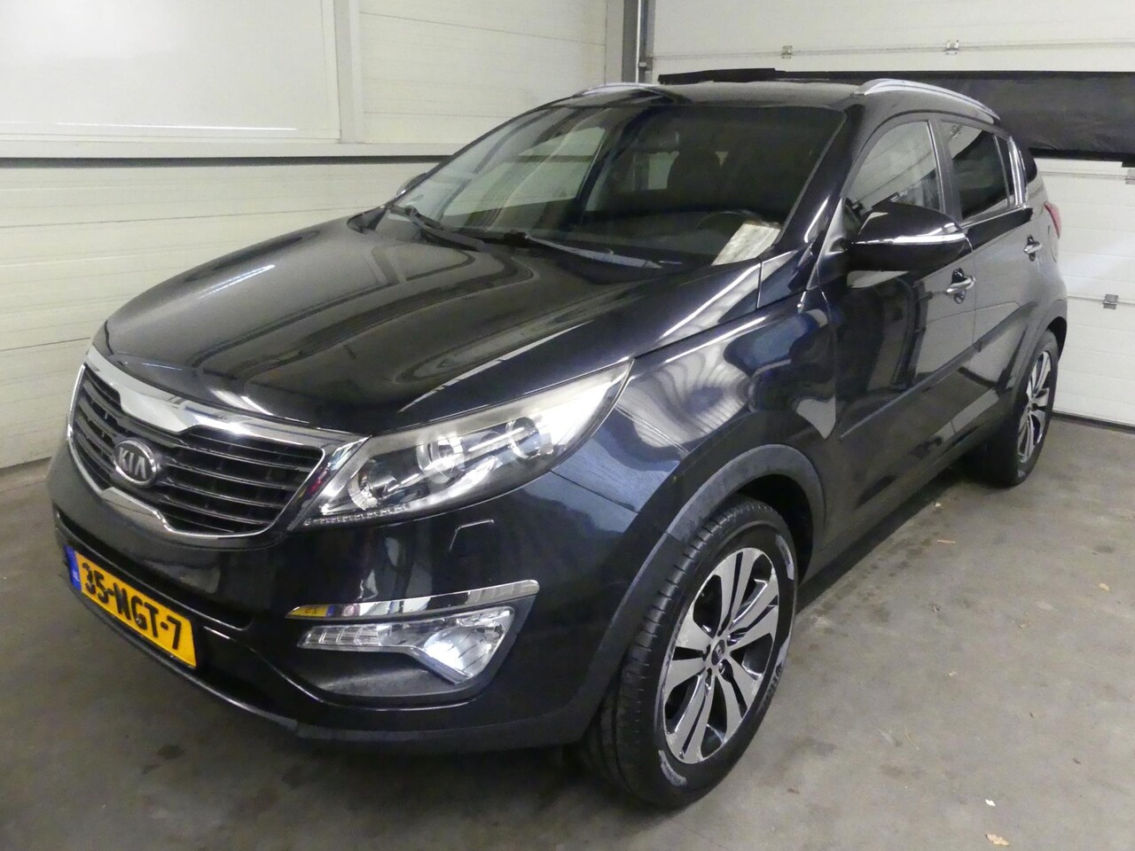 Kia Sportage - 2.0 X-clusive - Leer - KeyLess - Stoelverwarming - Trekhaak - AutoWereld.nl