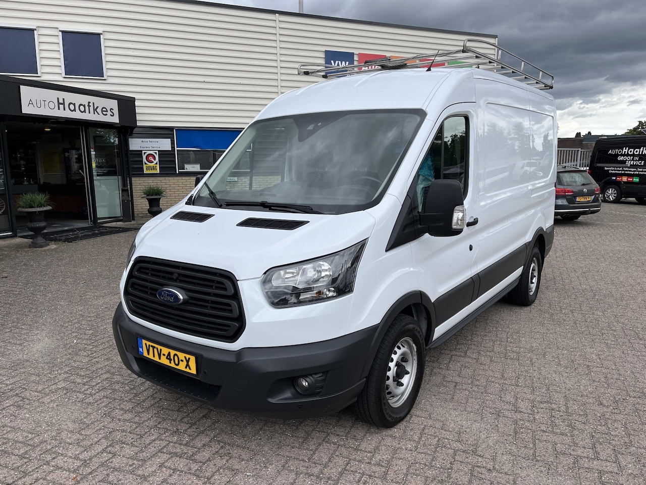 Ford Transit - 350 2.0 TDCI L2H3 Trend L2H3, RVS imperiaal met ladder, betimmering, prefect onderhouden. - AutoWereld.nl