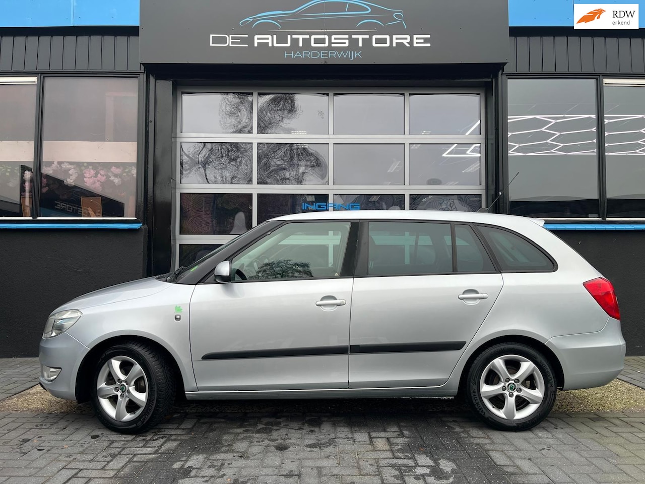 Skoda Fabia Combi - 1.2 TDI Greenline Airco navi Cruise Trekhaak - AutoWereld.nl