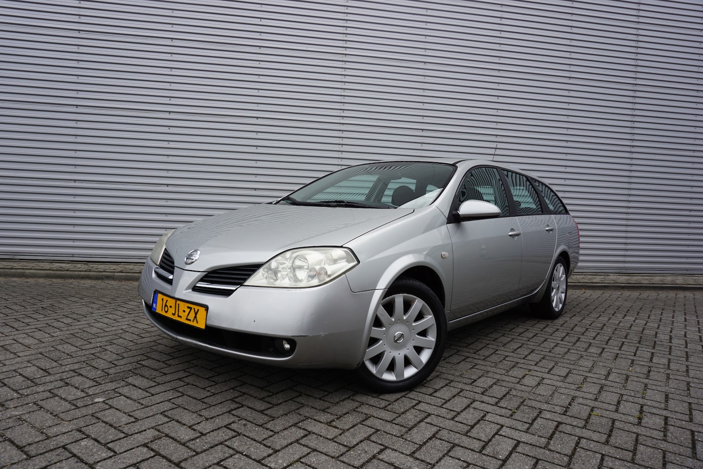 Nissan Primera Estate - 1.8 Tekna Airco / Navi / Elektr. ramen / Camera / NAP / APK t/m 25-03-2026 - AutoWereld.nl