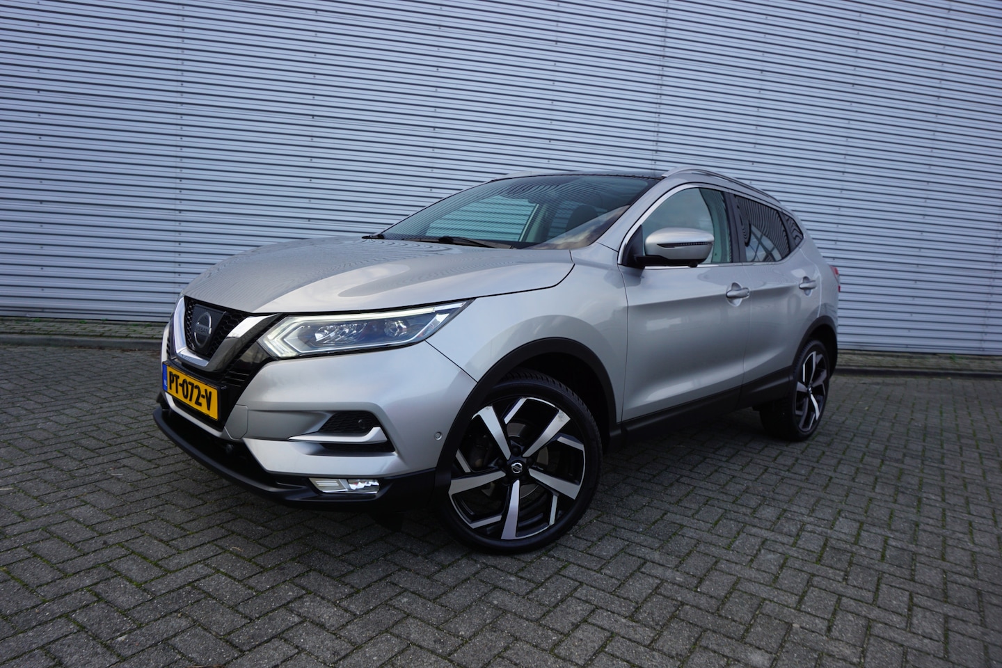 Nissan Qashqai - 1.2 Tekna 1e Eigenaar / Climate / Navi / Cruise / Pano / 360 camera / Lm velgen / NAP - AutoWereld.nl