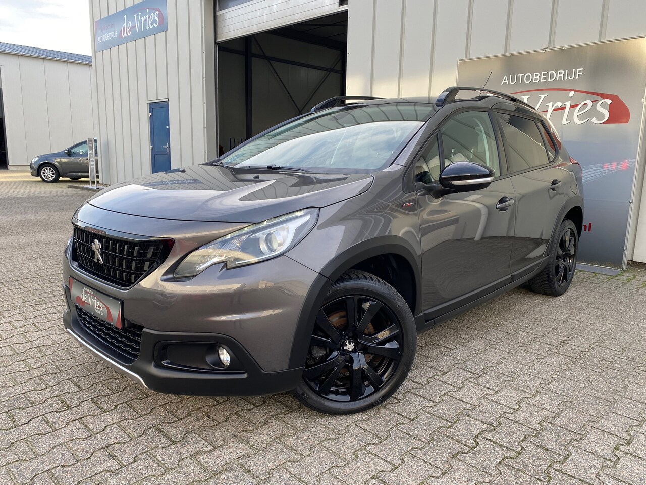 Peugeot 2008 - 1.2 PureTech 130PK GT-Line / Clima / Cruise / Navi / Panoramadak / Half leder - AutoWereld.nl