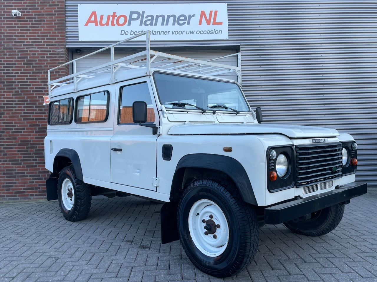 Land Rover Defender 110 - 2.5 Td5 110" County! 9-Persoons! - AutoWereld.nl