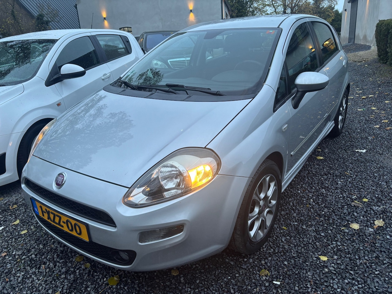 Fiat Punto Evo - 0.9 TwinAir Street KM 123229 MET NAP - AutoWereld.nl